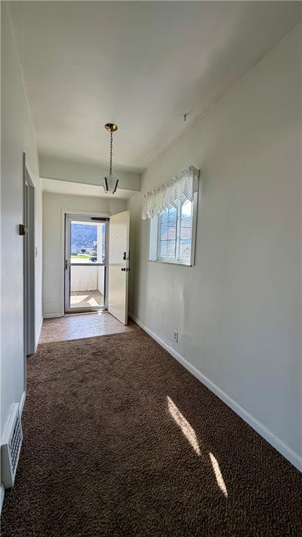 641 Garfield Street Springdale, PA 15144 - Photo 5 of 44 a view of empty room with windows