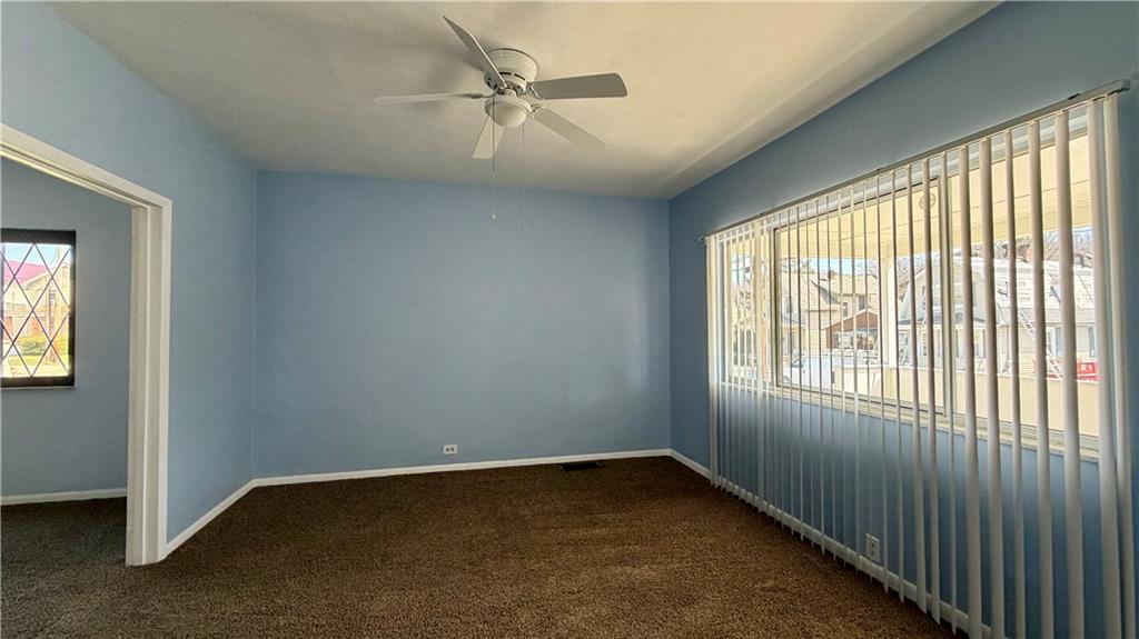 641 Garfield Street Springdale, PA 15144 - Photo 7 of 44 a view of an empty room with a window