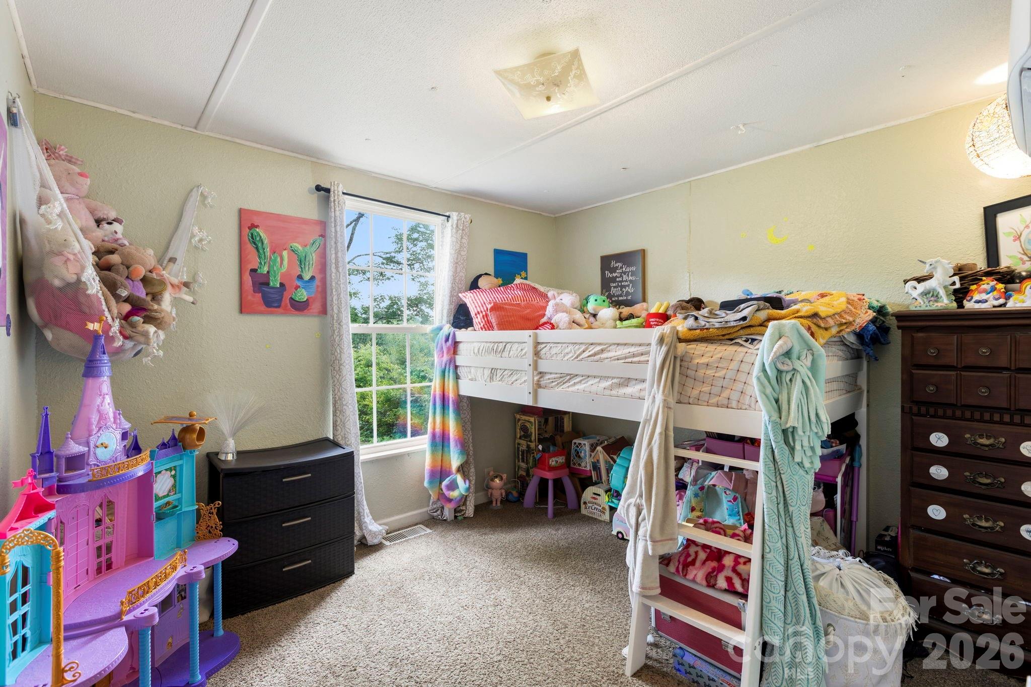 4 Mountain View Road Asheville, NC 28806 - Photo 25 of 35 a bed room with a bed and a desk