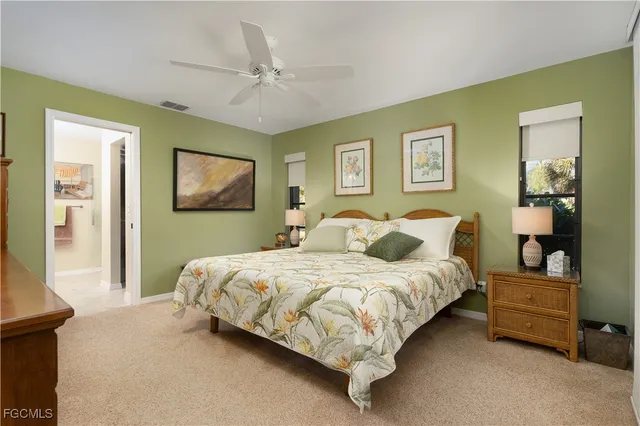 a bedroom with bed and window