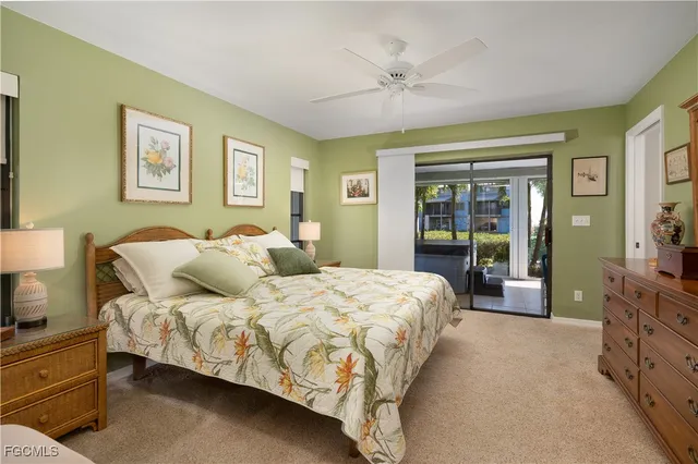 a bathroom with a granite countertop sink mirror and toilet