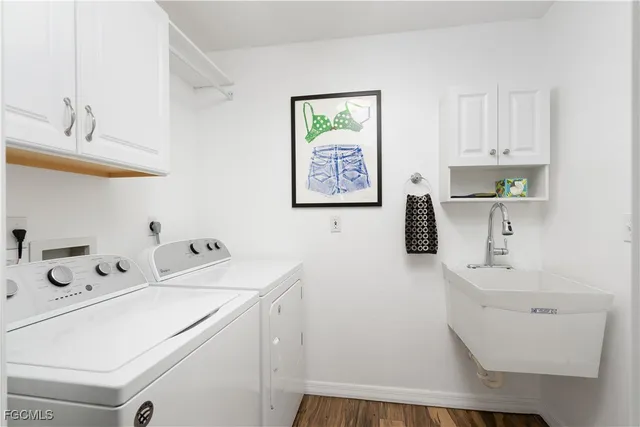 a living room with a table and chairs