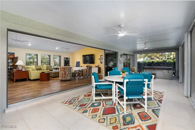 a room with furniture and a flat screen tv