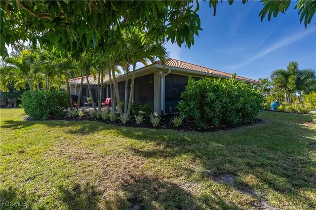 a view of a house with a big yard