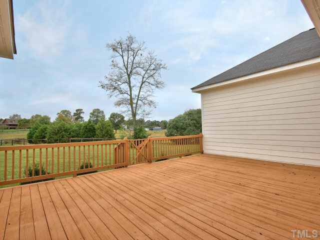 6820 Winding Ridge Road Zebulon, NC 27597 - Photo 21 of 25 Such a tranquil view off of your deck.