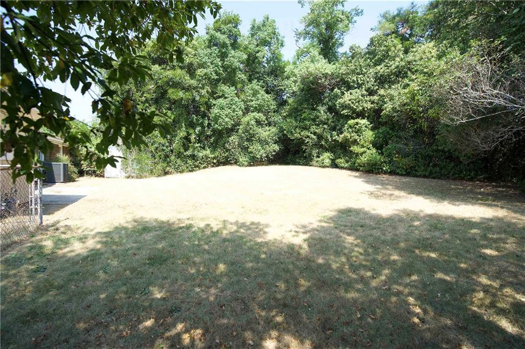 3091 Mustang Drive Columbus, GA 31909 - Photo 18 of 18 a view of a yard with a tree