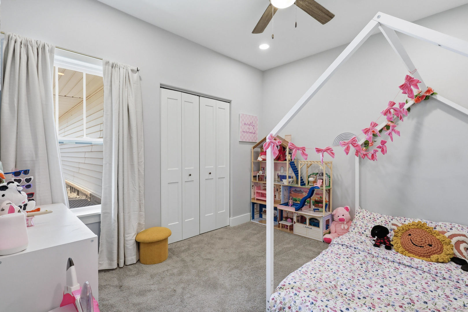 6779 Genesis Way Bettendorf, IA 52722 - Photo 24 of 36 a bedroom with furniture and a chandelier fan