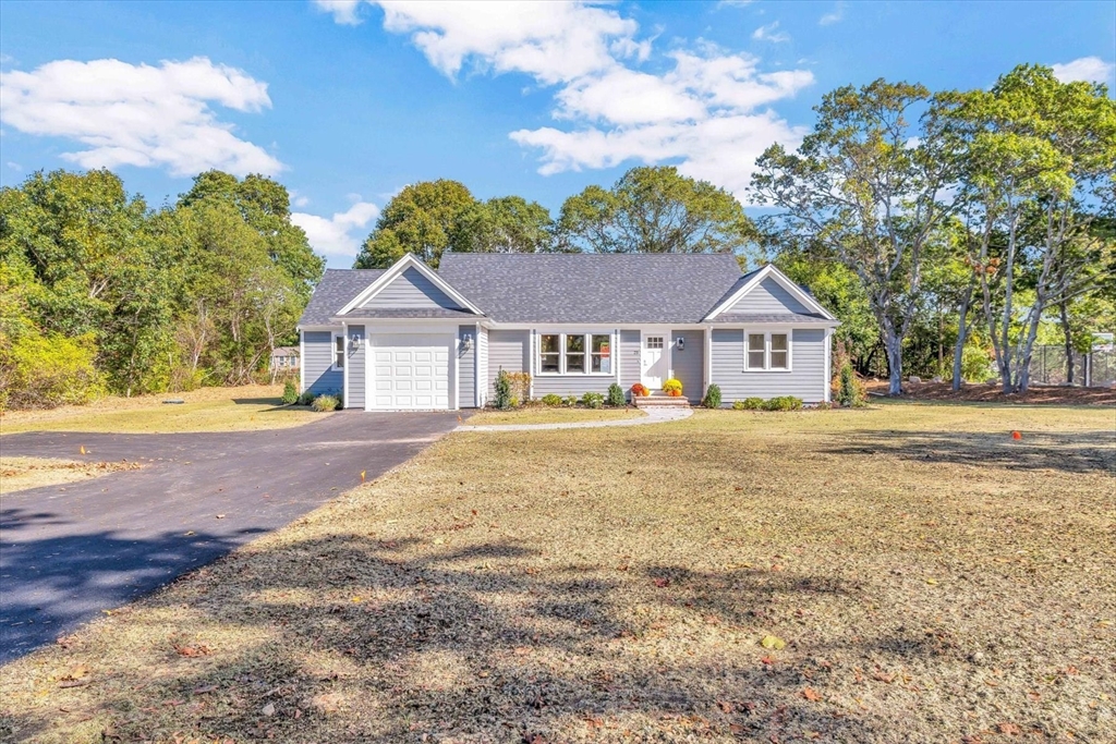 25 Percival Road Falmouth, MA 02536 - Photo 2 of 30 a front view of a house with garden