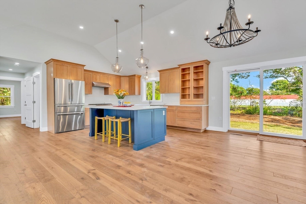 25 Percival Road Falmouth, MA 02536 - Photo 7 of 30 a kitchen with stainless steel appliances granite countertop a refrigerator a sink and a stove