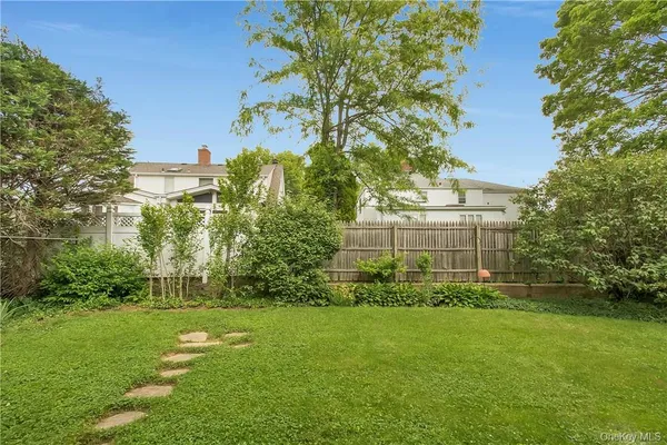 a view of a house with a garden
