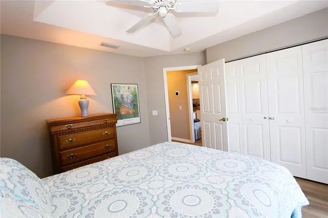 a bedroom with a bed and a dresser