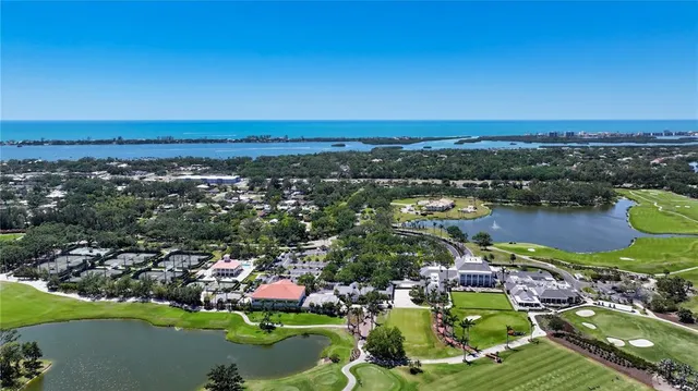 a view of a dining room with furniture wooden floor and a rug