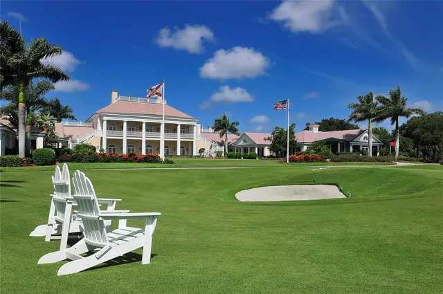 a view of a swimming pool with lounge chair