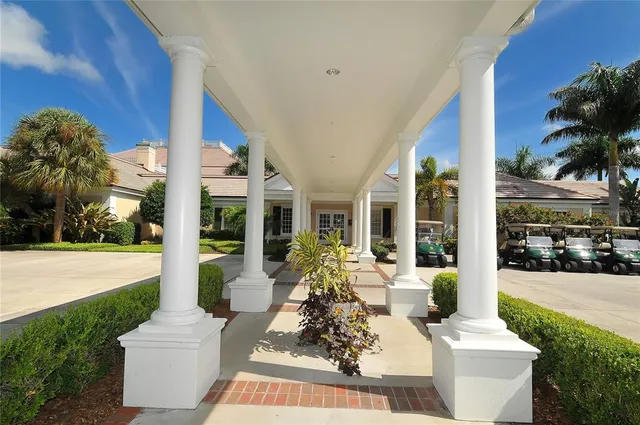 a view of a lake with houses in the back