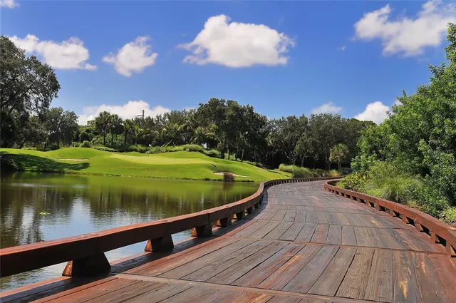 a view of small yard in front of house with a yard