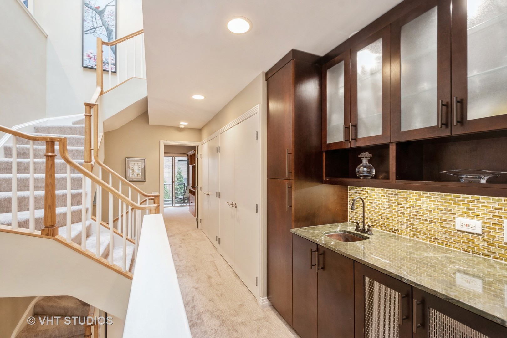 1000 North State Street, Unit 13 Chicago, IL 60610 - Photo 12 of 45 a kitchen with stainless steel appliances granite countertop a sink and a stove