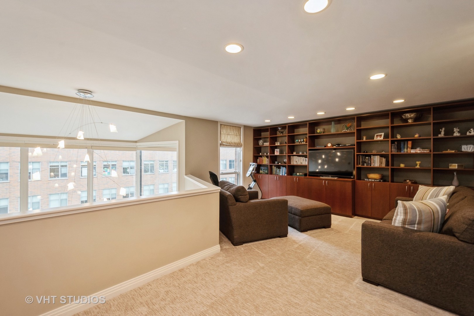 1000 North State Street, Unit 13 Chicago, IL 60610 - Photo 13 of 45 a living room with furniture and a large window