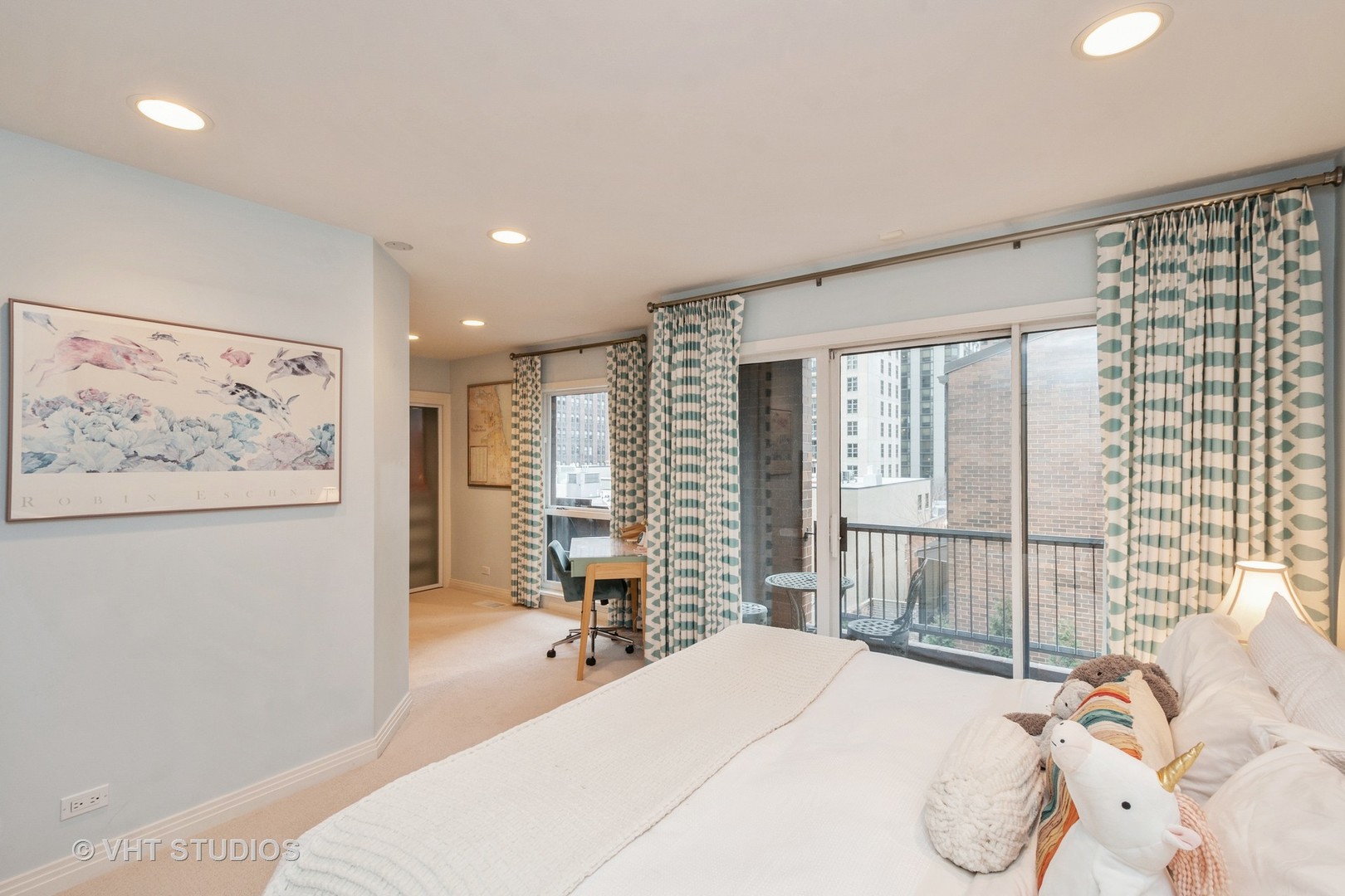 1000 North State Street, Unit 13 Chicago, IL 60610 - Photo 17 of 45 a bedroom with a bed and a large window