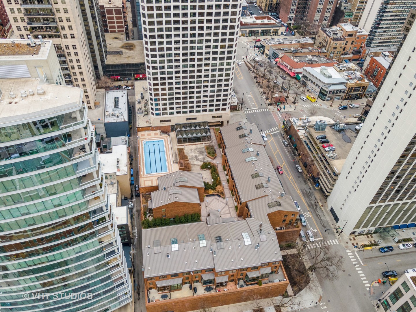 1000 North State Street, Unit 13 Chicago, IL 60610 - Photo 40 of 45 an aerial view of residential houses with outdoor space