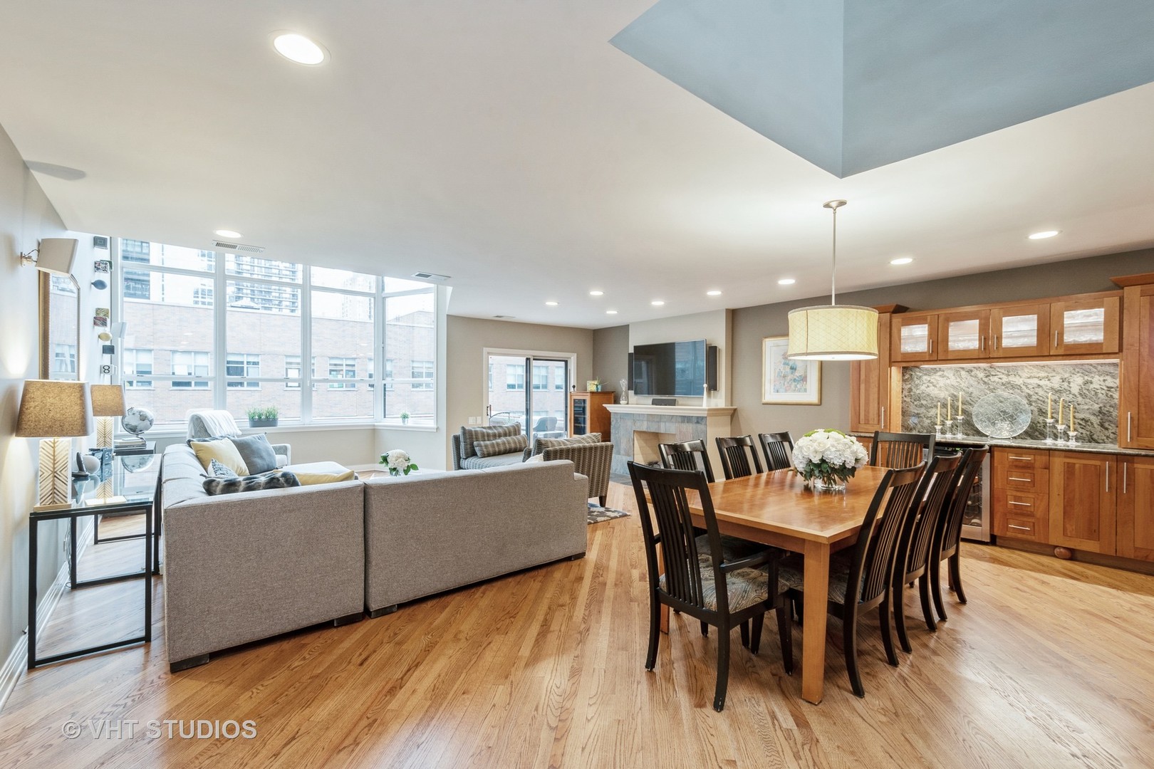 1000 North State Street, Unit 13 Chicago, IL 60610 - Photo 5 of 45 a view of a dining room with furniture window and wooden floor