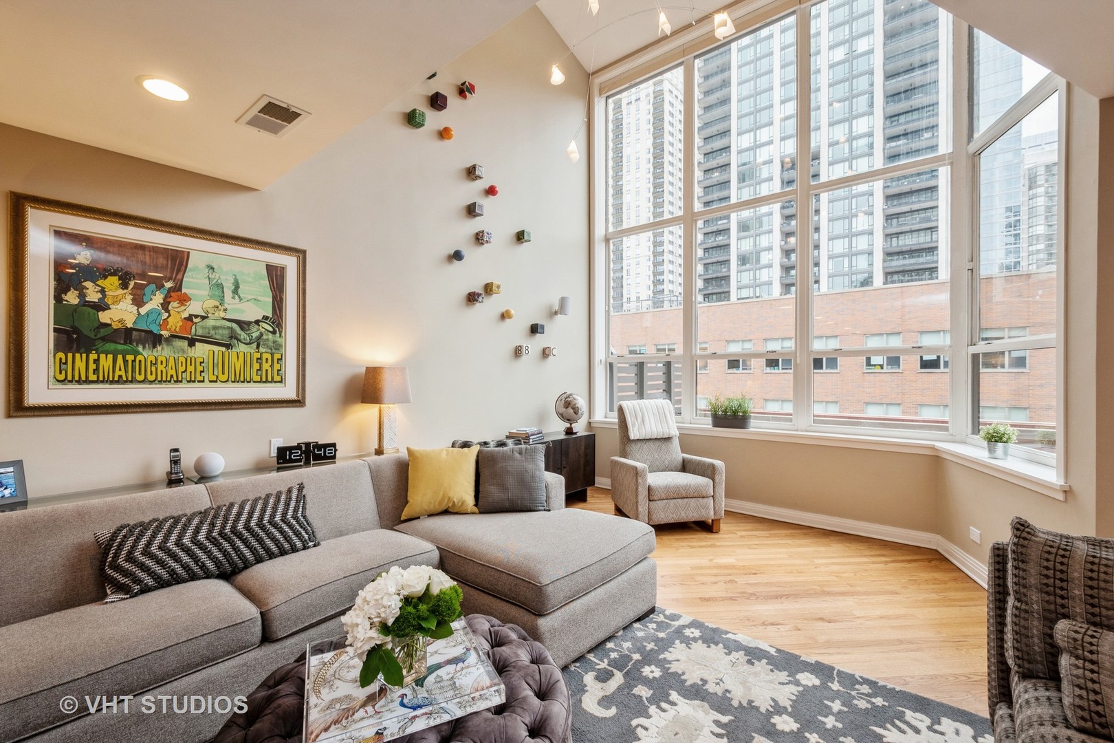 1000 North State Street, Unit 13 Chicago, IL 60610 - Photo 6 of 45 a living room with furniture and a large window