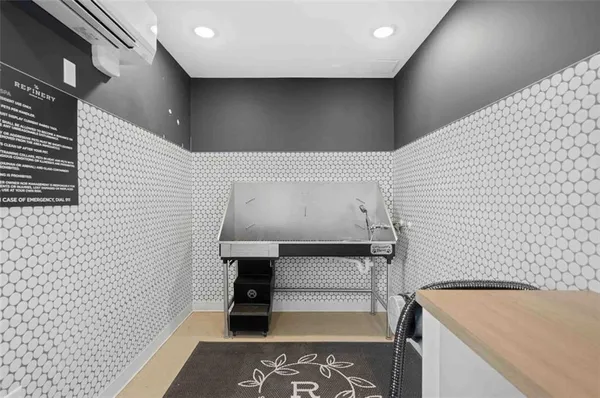 a view of swimming pool with seating area and furniture