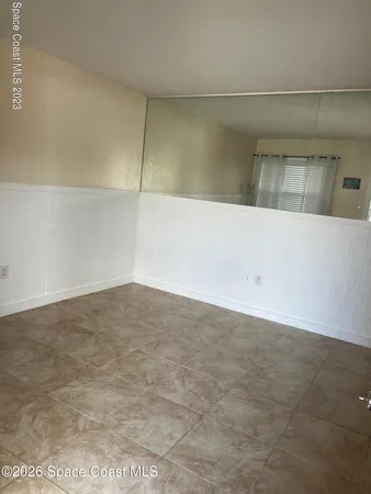 a view of a room with an empty space