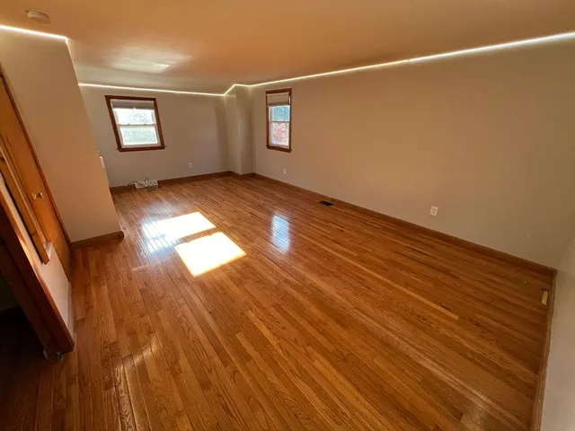 a view of an empty room and window