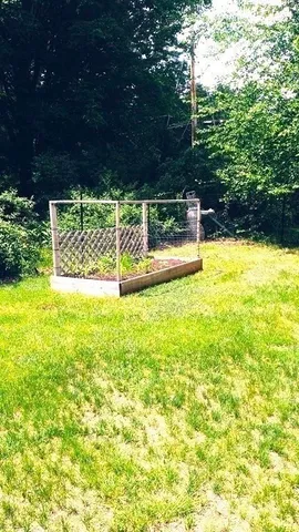 a view of swimming pool with a patio