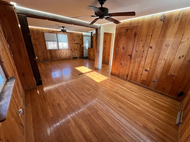 a view of entryway with wooden floor