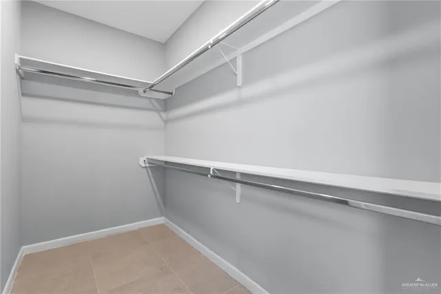 a view of a room with shelf on the wall