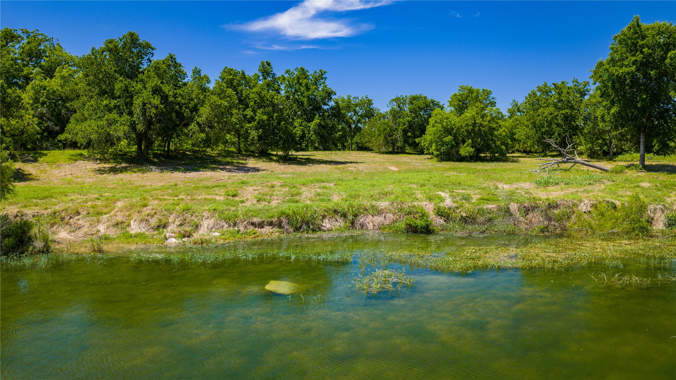 Tbd Lost Acres Loop Blanco, TX 78606 - Photo 5 of 39 a view of a golf course with a lake