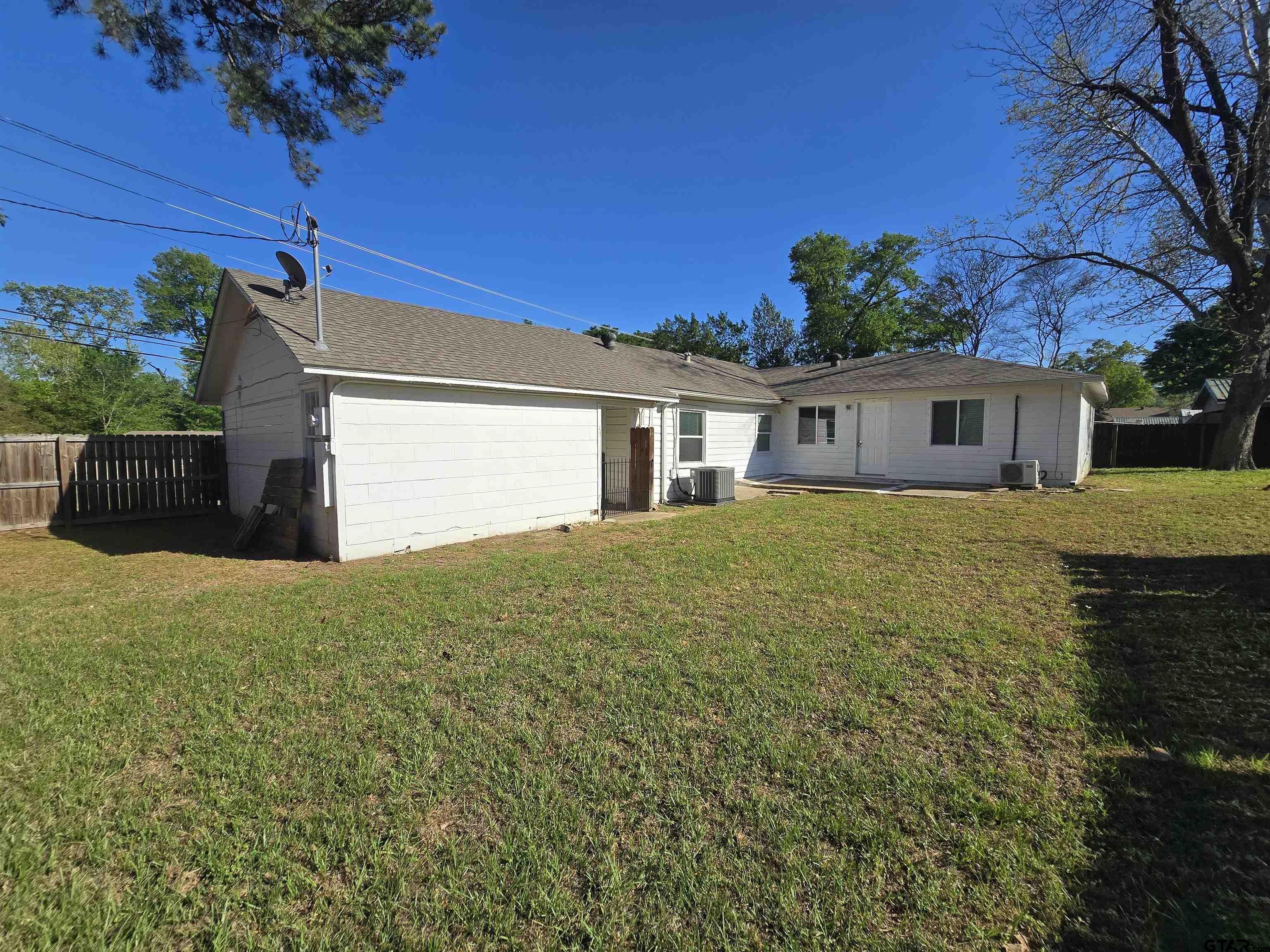 3623 New Copeland Road Tyler, TX 75701 - Photo 37 of 42 a front view of a house with garden