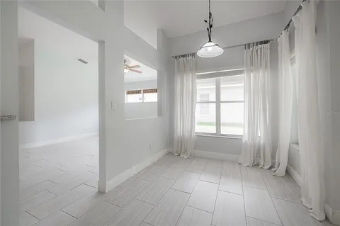 an empty room with a window