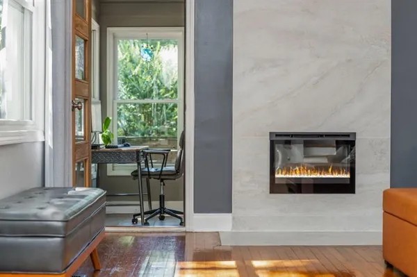 a living room with furniture and a window
