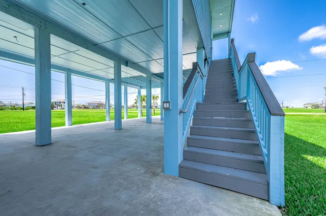 a view of a porch and wooden floor