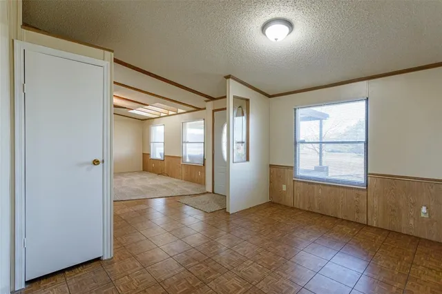 a large kitchen with a cabinets and appliances
