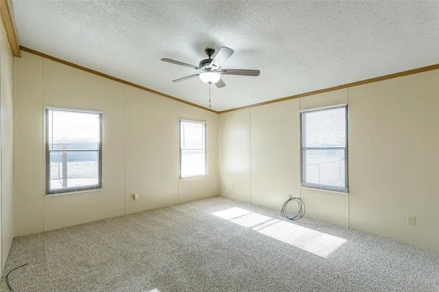 a bathroom with a shower sink and mirror