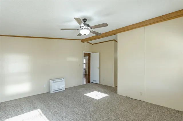 a bathroom with a double vanity sink a mirror and a shower