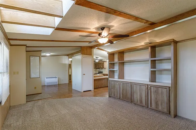 a view of a room with shelves