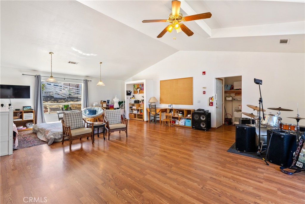 3880 Ardilla Road Atascadero, CA 93422 - Photo 19 of 60 a living room with furniture and wooden floor