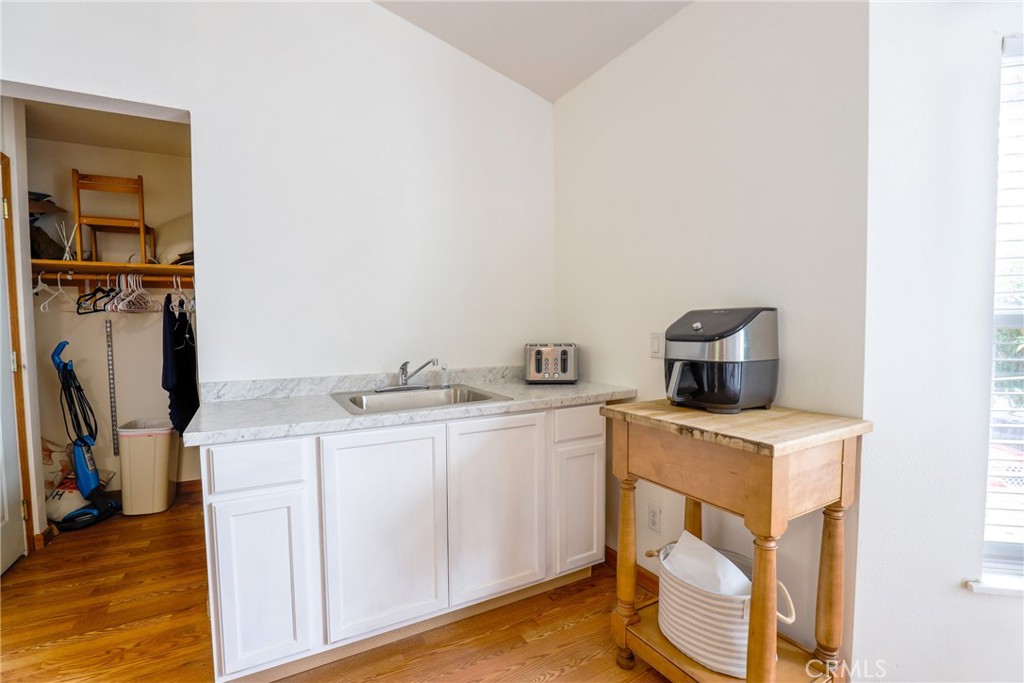 3880 Ardilla Road Atascadero, CA 93422 - Photo 20 of 66 There is a built-in kitchenette/wet bar area! The sink and cabinets bring versatility to the space.