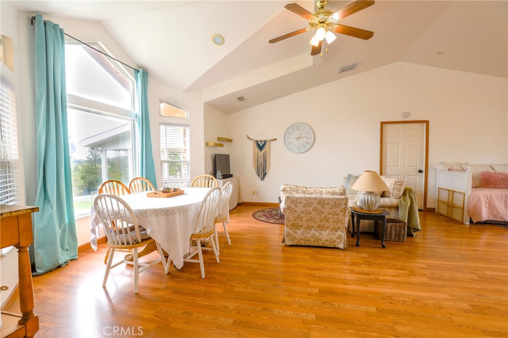 3880 Ardilla Road Atascadero, CA 93422 - Photo 21 of 66 The bonus room is currently staged as a separate living space complete with a dining area, living room and bedroom area.