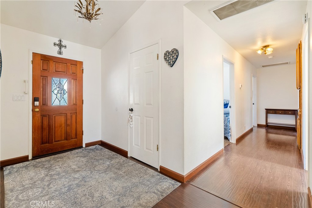 3880 Ardilla Road Atascadero, CA 93422 - Photo 22 of 60 a view of empty room with wooden floor