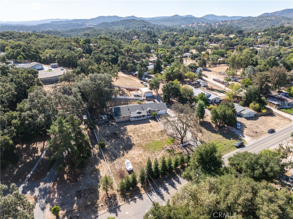 3880 Ardilla Road Atascadero, CA 93422 - Photo 30 of 60 an aerial view of house with yard and mountain view in back