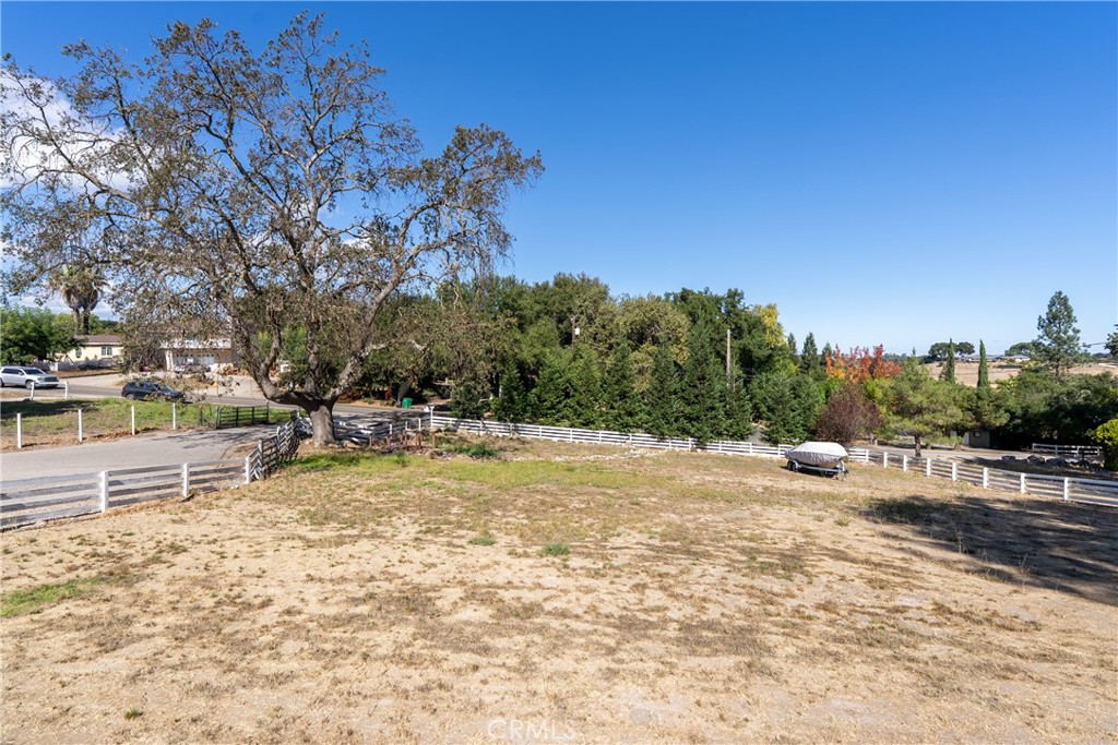 3880 Ardilla Road Atascadero, CA 93422 - Photo 40 of 66 Tree lined fence provides divine privacy from the street.