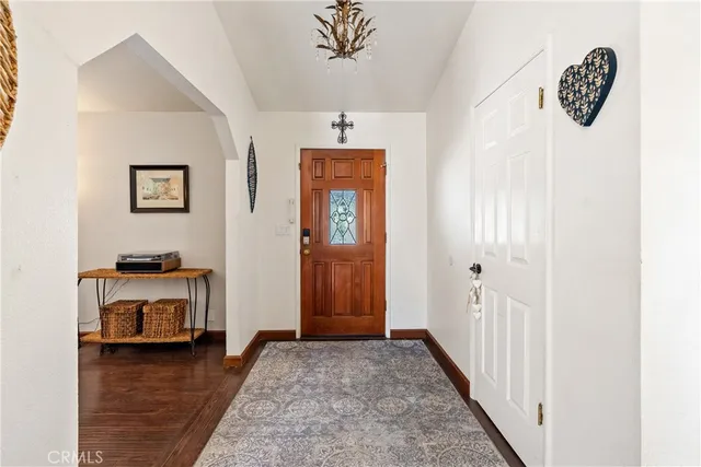 a living room with furniture or couch and a flat screen tv