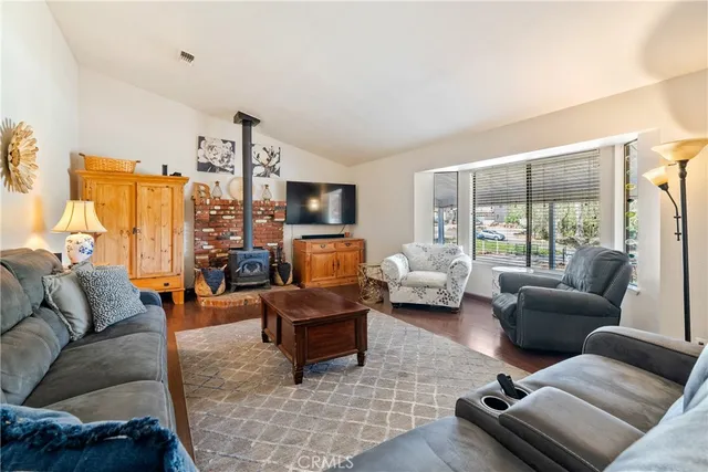 a living room with furniture and a couch