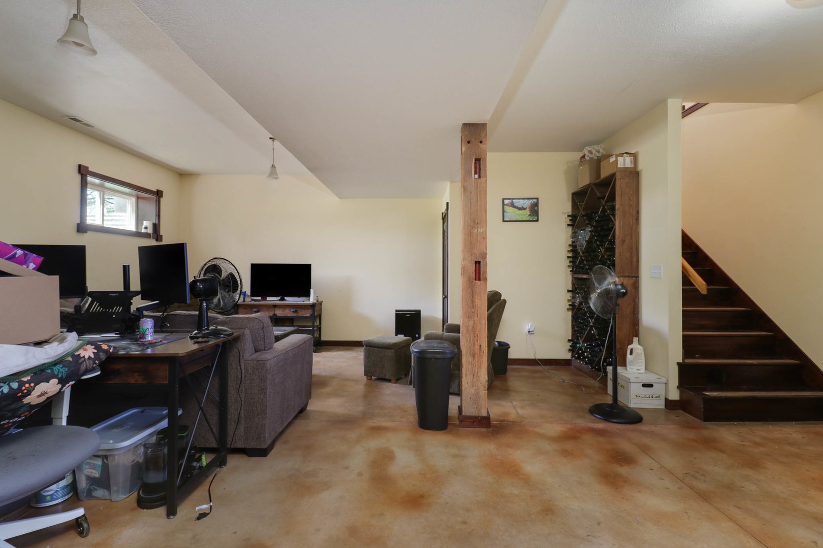 12014 Prairie Center Road Clinton, IL 61727 - Photo 22 of 56 a view of a livingroom with workspace and a window