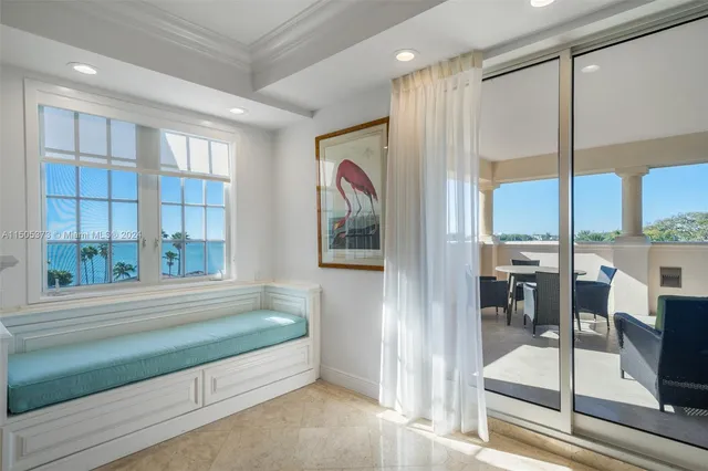 a en suite bathroom with a tub and a large window